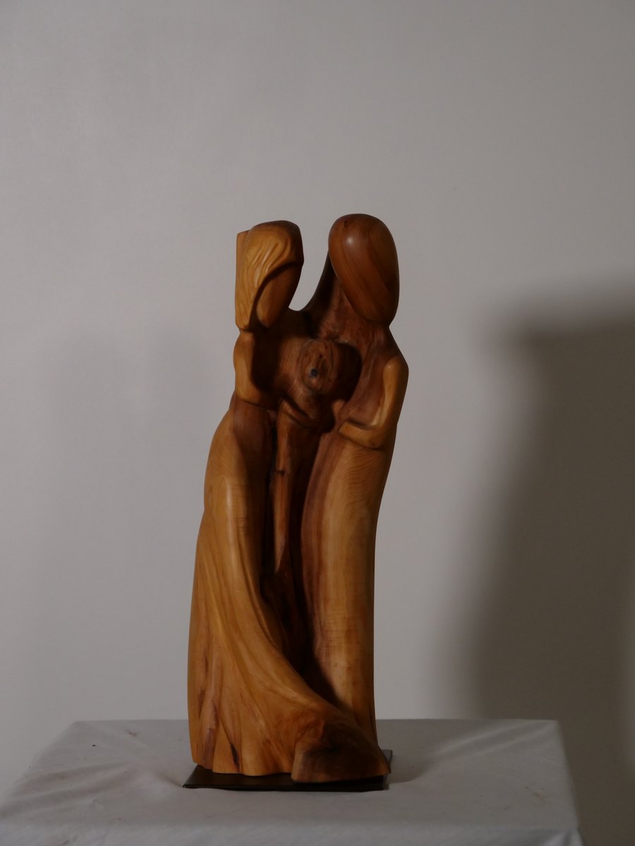 Deux formes serrées dans un même bloc de bois